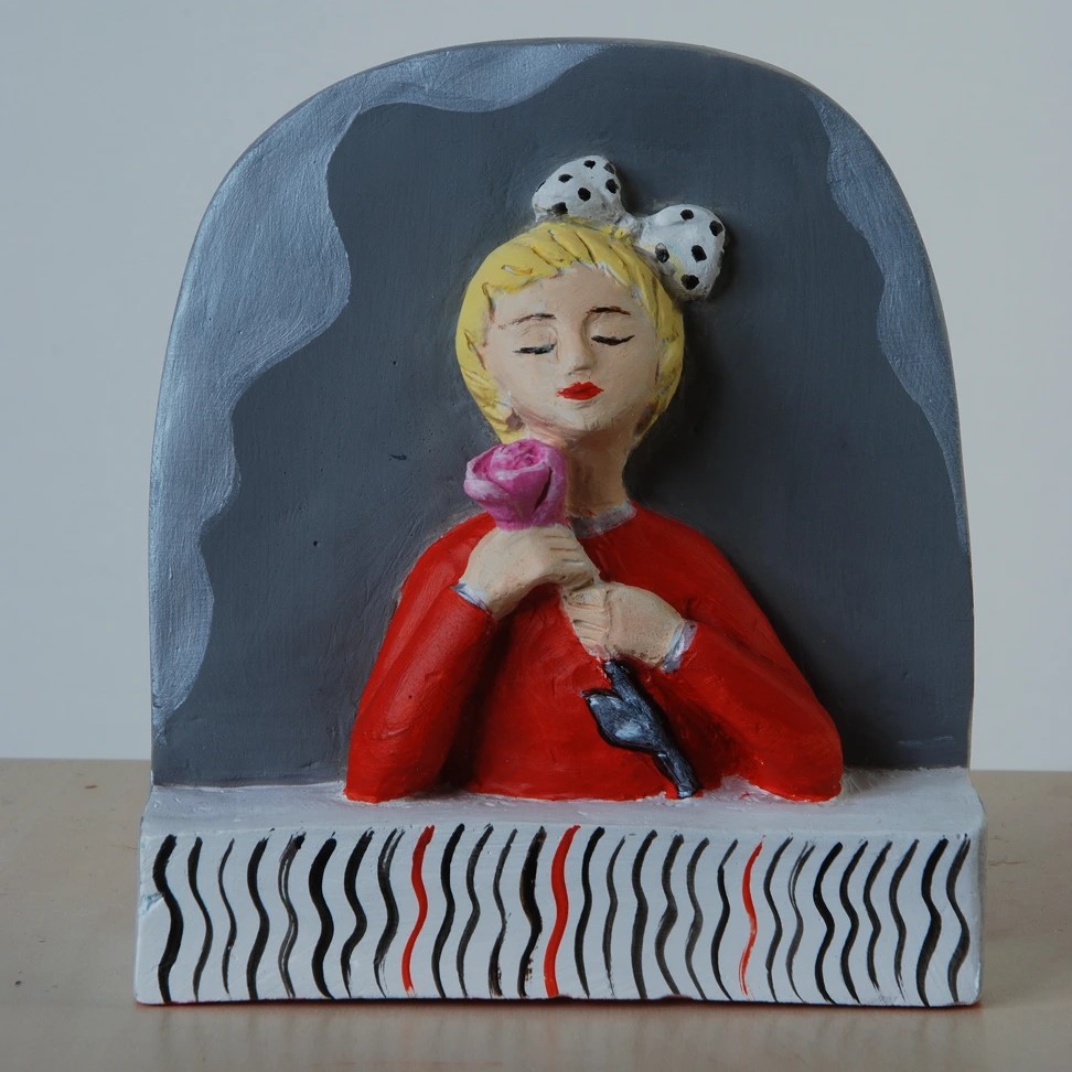 Devojčica sa ružom