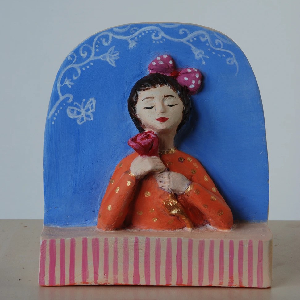 Devojčica sa ružom